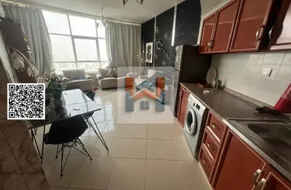 شقة - غرفة نوم - 2 حمامات للايجار في أورينت تاور 1 - أورينت تاور - البستان - عجمان