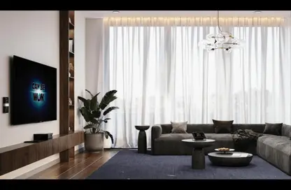 Living Room image for: Apartment - 1 Bathroom for sale in Gateway - Jumeirah Village Circle - Dubai, Image 1