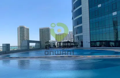 Pool image for: Apartment - 1 Bathroom for rent in Hydra Avenue Towers - City Of Lights - Al Reem Island - Abu Dhabi, Image 1