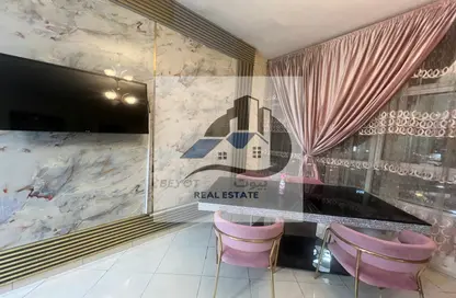 شقة - غرفة نوم - 2 حمامات للايجار في أورينت تاور 1 - أورينت تاور - البستان - عجمان