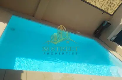 Pool image for: Villa - 5 Bedrooms - 6 Bathrooms for sale in Al Reef Villas - Al Reef - Abu Dhabi, Image 1