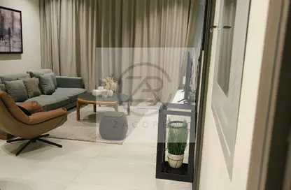 Apartment - 1 Bedroom - 2 Bathrooms for rent in Emerald Vision Tower - Jumeirah Village Triangle - Dubai