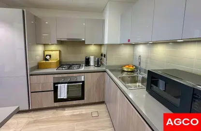 Kitchen image for: Apartment - 1 Bedroom - 1 Bathroom for rent in Waves Grande - Sobha Hartland - Mohammed Bin Rashid City - Dubai, Image 1