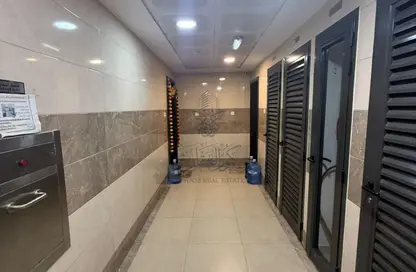 عمارة بالكامل - 8 غرف نوم للبيع في تجارية مويلح - الشارقة