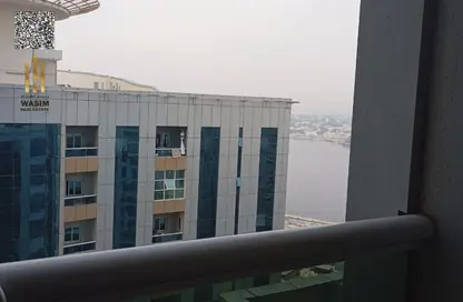 Apartment - 1 Bedroom - 2 Bathrooms for sale in Orient Towers - Al Bustan - Ajman