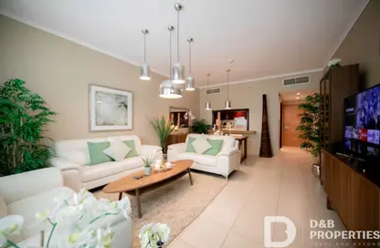 Living Room image for: Apartment - 1 Bedroom - 2 Bathrooms for sale in Burj Views podium - Burj Views - Downtown Dubai - Dubai, Image 1