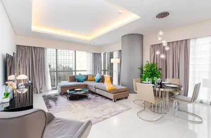Living / Dining Room image for: Apartment - 2 Bedrooms - 2 Bathrooms for rent in Tower B - DAMAC Towers by Paramount - Business Bay - Dubai, Image 1