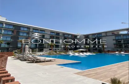 Pool image for: Apartment - 1 Bedroom - 1 Bathroom for rent in Oxford 212 - Jumeirah Village Circle - Dubai, Image 1