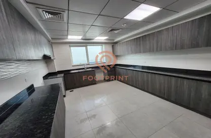 صورة لـ مطبخ شقة - 3 غرف نوم - 4 حمامات للبيع في اوركيد ريزيدنس - حديقة دبي العلميه - دبي ، صورة رقم 1