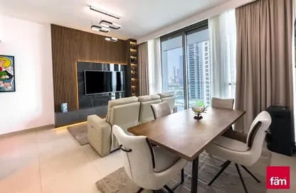 Living / Dining Room image for: Apartment - 1 Bedroom - 2 Bathrooms for sale in Downtown Views - Downtown Dubai - Dubai, Image 1