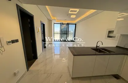 Kitchen image for: Apartment - 1 Bedroom - 2 Bathrooms for rent in Samana Golf Avenue - Dubai Studio City - Dubai, Image 1