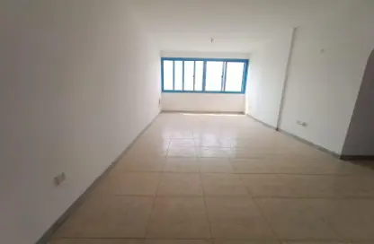 Empty Room image for: Apartment - 2 Bedrooms - 2 Bathrooms for rent in Al Khaili Tower - Khalifa Street - Abu Dhabi, Image 1