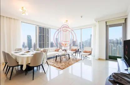 Living / Dining Room image for: Apartment - 2 Bedrooms - 3 Bathrooms for rent in Boulevard Point - Downtown Dubai - Dubai, Image 1