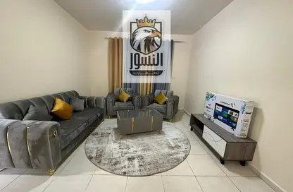 Living Room image for: Apartment - 1 Bedroom - 2 Bathrooms for rent in Al Rumailah building - Al Rumailah 2 - Al Rumaila - Ajman, Image 1