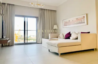 Living Room image for: Apartment - 1 Bedroom - 2 Bathrooms for rent in BAB ALQarya Tower - Jumeirah Village Circle - Dubai, Image 1