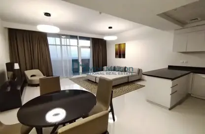 Living / Dining Room image for: Apartment - 2 Bedrooms - 3 Bathrooms for rent in Tower 108 - Jumeirah Village Circle - Dubai, Image 1