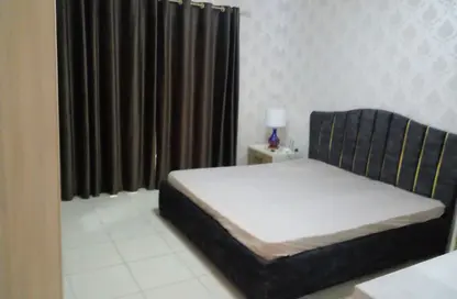 Apartment - 1 Bedroom - 2 Bathrooms for rent in Orient Tower 1 - Orient Towers - Al Bustan - Ajman