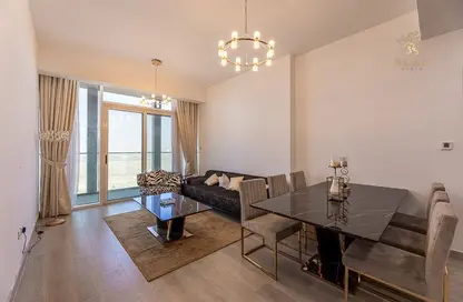 Living / Dining Room image for: Apartment - 3 Bedrooms - 3 Bathrooms for sale in BLOOM TOWERS A - Bloom Towers - Jumeirah Village Circle - Dubai, Image 1