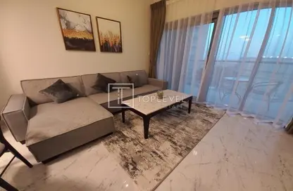 Living Room image for: Apartment - 1 Bathroom for sale in MAG 515 - MAG 5 - Dubai South (Dubai World Central) - Dubai, Image 1