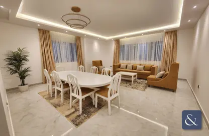 Living / Dining Room image for: Apartment - 2 Bedrooms - 2 Bathrooms for rent in Marina Pinnacle - Dubai Marina - Dubai, Image 1