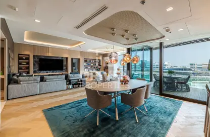 Living / Dining Room image for: Apartment - 3 Bedrooms - 4 Bathrooms for sale in Bulgari Resort  and  Residences - Jumeirah Bay Island - Jumeirah - Dubai, Image 1