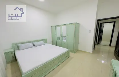 Room / Bedroom image for: Apartment - 1 Bedroom - 2 Bathrooms for rent in Al Mowaihat 2 - Al Mowaihat - Ajman, Image 1