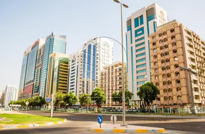عمارة بالكامل - استوديو للبيع في ماشوي القبيسي - شارع المطار - أبوظبي