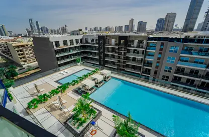 Pool image for: Apartment - 3 Bedrooms - 2 Bathrooms for sale in Binghatti Crest - Jumeirah Village Circle - Dubai, Image 1