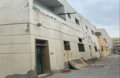 عمارة بالكامل - استوديو - 5 حمامات للبيع في تجارية مويلح - الشارقة