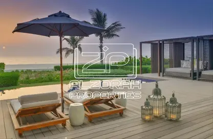 Terrace image for: Villa - 4 Bedrooms - 6 Bathrooms for sale in Beachfront - Al Zorah - Ajman, Image 1