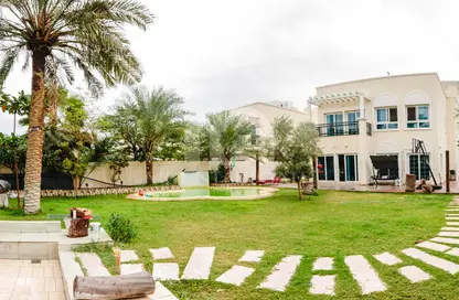 Garden image for: Villa - 2 Bedrooms - 4 Bathrooms for sale in District 16 - Jumeirah Village Circle - Dubai, Image 1