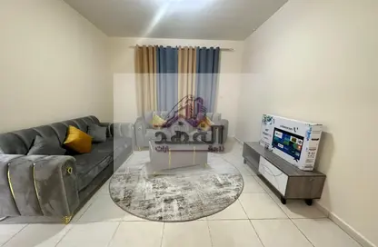 Living Room image for: Apartment - 1 Bedroom - 1 Bathroom for rent in Al Rumailah building - Al Rumailah 2 - Al Rumaila - Ajman, Image 1