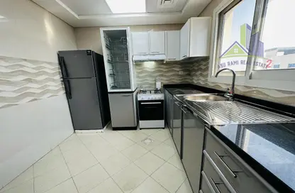 Kitchen image for: Apartment - 2 Bedrooms - 3 Bathrooms for rent in Sheikh Jaber Al Sabah Street - Al Naimiya - Al Nuaimiya - Ajman, Image 1