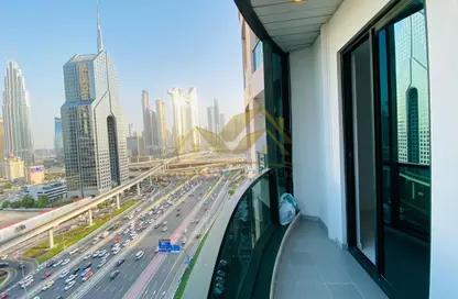 شقة - 2 غرف نوم - 3 حمامات للايجار في برج المريخي - شارع الشيخ زايد - دبي