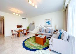Living / Dining Room image for: Apartment - 2 bedrooms - 3 bathrooms for rent in Blue Beach Tower - Jumeirah Beach Residence - Dubai, Image 1