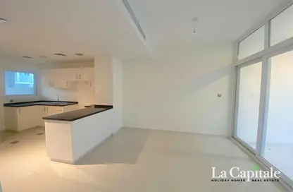 Townhouse - 3 Bedrooms - 3 Bathrooms for sale in Aknan Villas - Victoria - Damac Hills 2 - Dubai