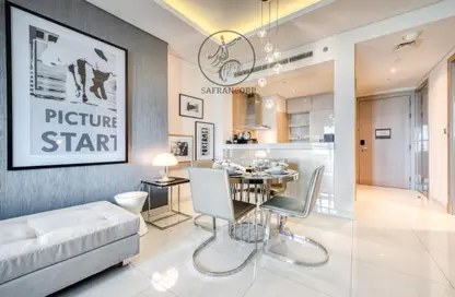 Living / Dining Room image for: Apartment - 1 Bedroom - 2 Bathrooms for sale in Tower D - DAMAC Towers by Paramount - Business Bay - Dubai, Image 1