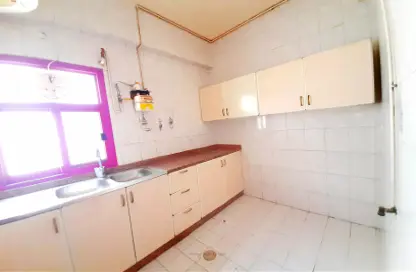 Kitchen image for: Apartment - 2 Bedrooms - 2 Bathrooms for rent in Al Wahda - Sharjah, Image 1