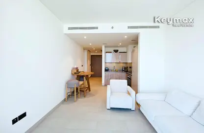 Living / Dining Room image for: Apartment - 1 Bedroom - 1 Bathroom for rent in Sobha Hartland Waves - Sobha Hartland - Mohammed Bin Rashid City - Dubai, Image 1