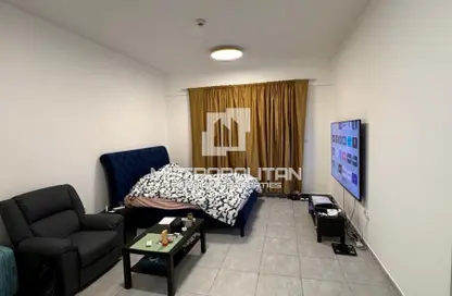 Room / Bedroom image for: Apartment - 1 Bathroom for sale in Sherena Residence - Majan - Dubai, Image 1