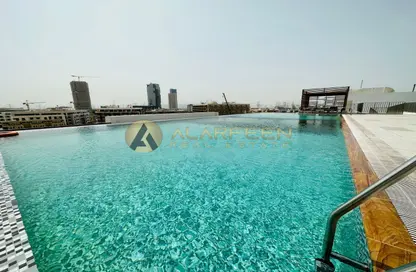 Pool image for: Apartment - 1 Bathroom for rent in La Perla Blanca - Jumeirah Village Circle - Dubai, Image 1