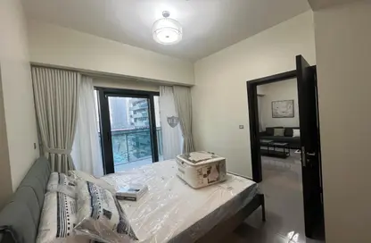 صورة لـ غرفة- غرفة النوم شقة - غرفة نوم - 2 حمامات للايجار في برج ميرانو - الخليج التجاري - دبي ، صورة رقم 1