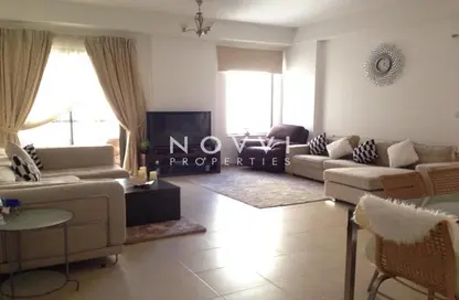 Living Room image for: Apartment - 2 Bedrooms - 2 Bathrooms for sale in Bahar 1 - Bahar - Jumeirah Beach Residence - Dubai, Image 1