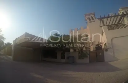 Outdoor Building image for: Townhouse - 5 Bedrooms - 4 Bathrooms for sale in The Townhouses at Al Hamra Village - Al Hamra Village - Ras Al Khaimah, Image 1