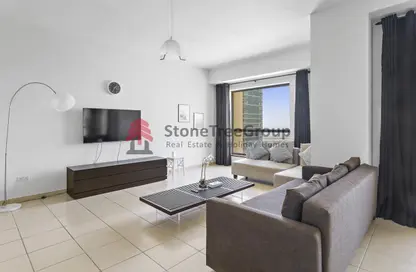Living Room image for: Apartment - 1 Bedroom - 1 Bathroom for rent in Shams 4 - Shams - Jumeirah Beach Residence - Dubai, Image 1