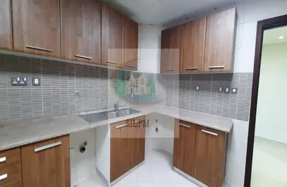 Kitchen image for: Apartment - 3 Bedrooms - 3 Bathrooms for rent in Madinat Zayed - Abu Dhabi, Image 1