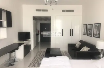 Living Room image for: Apartment - 1 Bathroom for rent in Giovanni Boutique Suites - Dubai Sports City - Dubai, Image 1