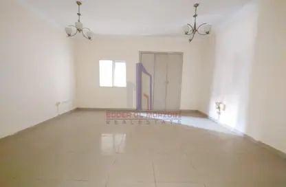 Empty Room image for: Apartment - 1 Bathroom for rent in Al Fajir Tower - Al Nahda - Sharjah, Image 1