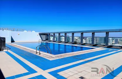 Pool image for: Apartment - 2 Bedrooms - 3 Bathrooms for rent in Pearl Tower - Electra Street - Abu Dhabi, Image 1