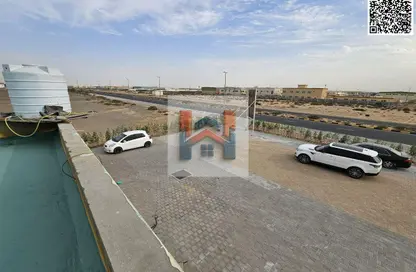 عمارة بالكامل - استوديو - 8 حمامات للبيع في الصجعة الصناعية - آلصجعه - الشارقة
